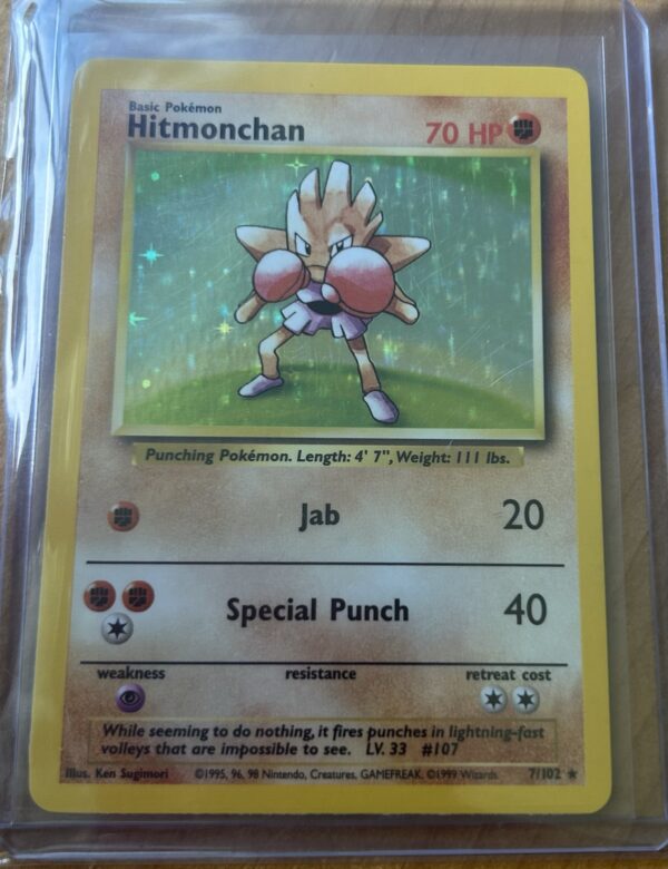 Hitmonchan Holo – Base Set 7/102 (Unlimited, NM)